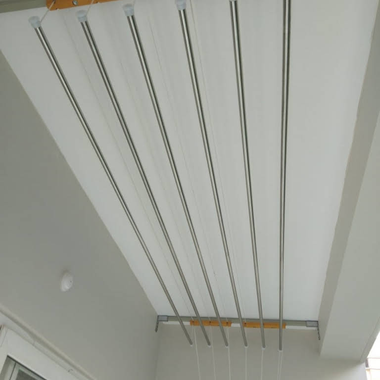 Close-up of stainless steel rods of an installed EverDry hanger